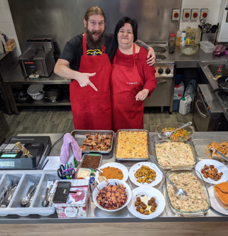 Nurses eating one of the free meals provided by community grant recipient, Hospitality for Heros